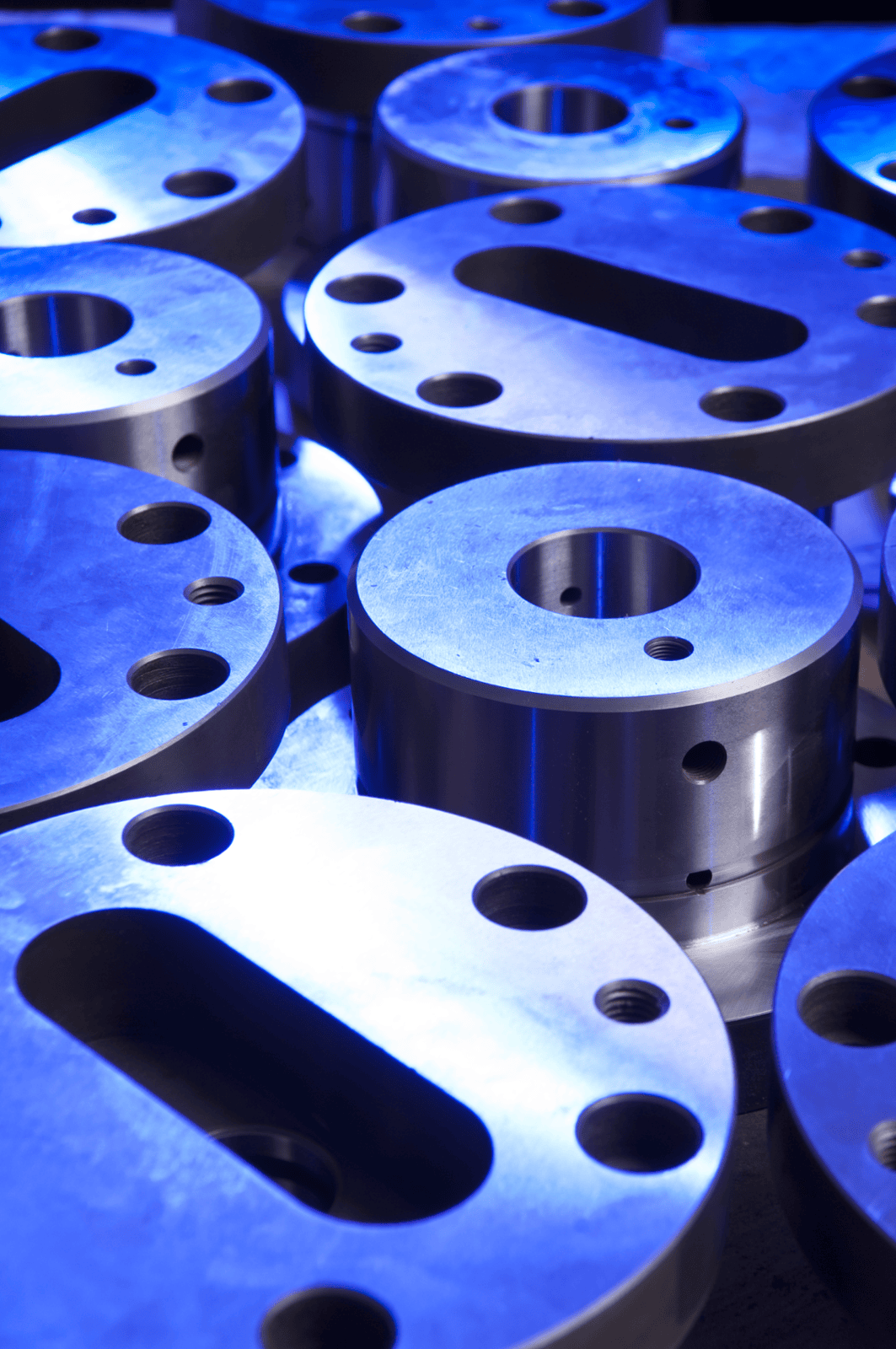 A visually interesting grid of tight tolerance CNC turned and CNC Machined parts with a satin appearance