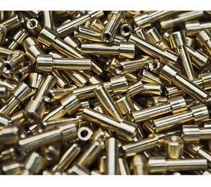 A large volume of precision turned and ground brass standoffs for an aerospace application